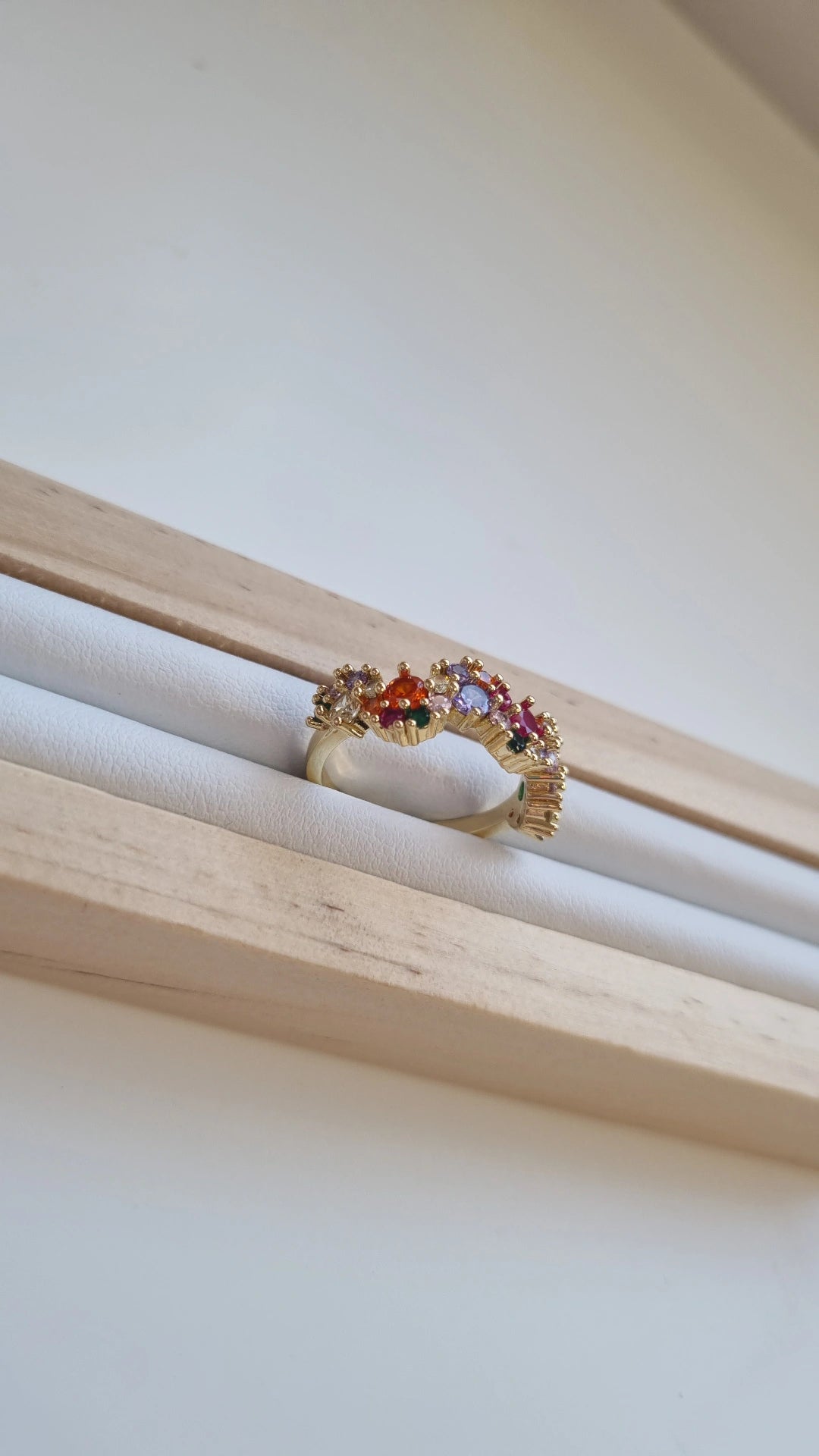 Colourful inlaid swirl style ring
