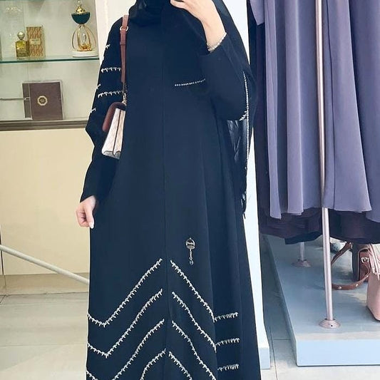 Black abaya with shoulder and bottom embellishments