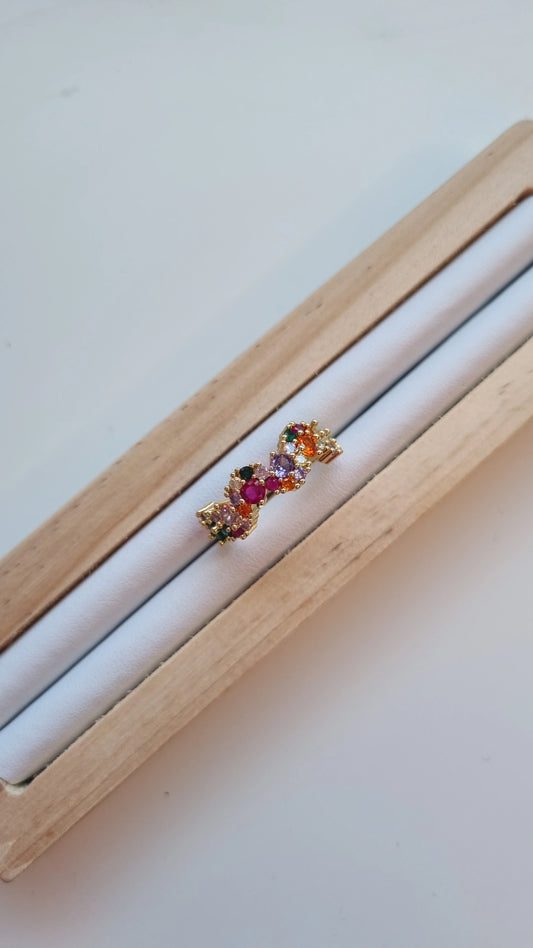 Colourful inlaid swirl style ring