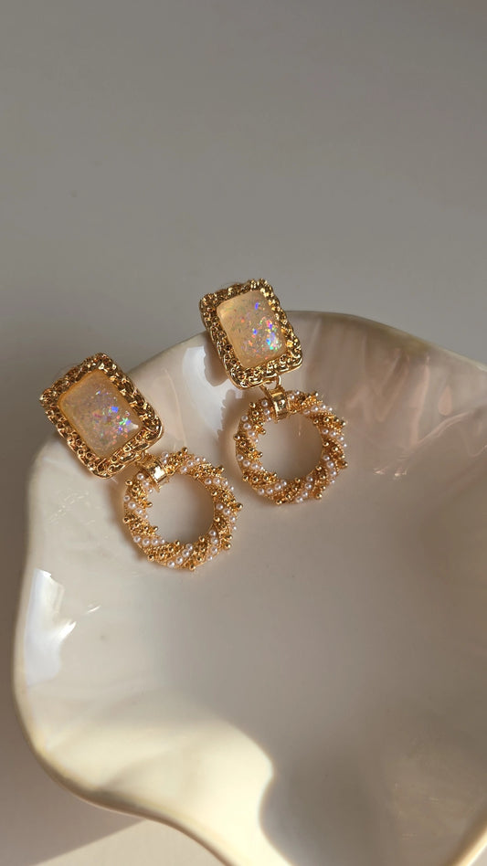 Gold plated pearl hoop earring