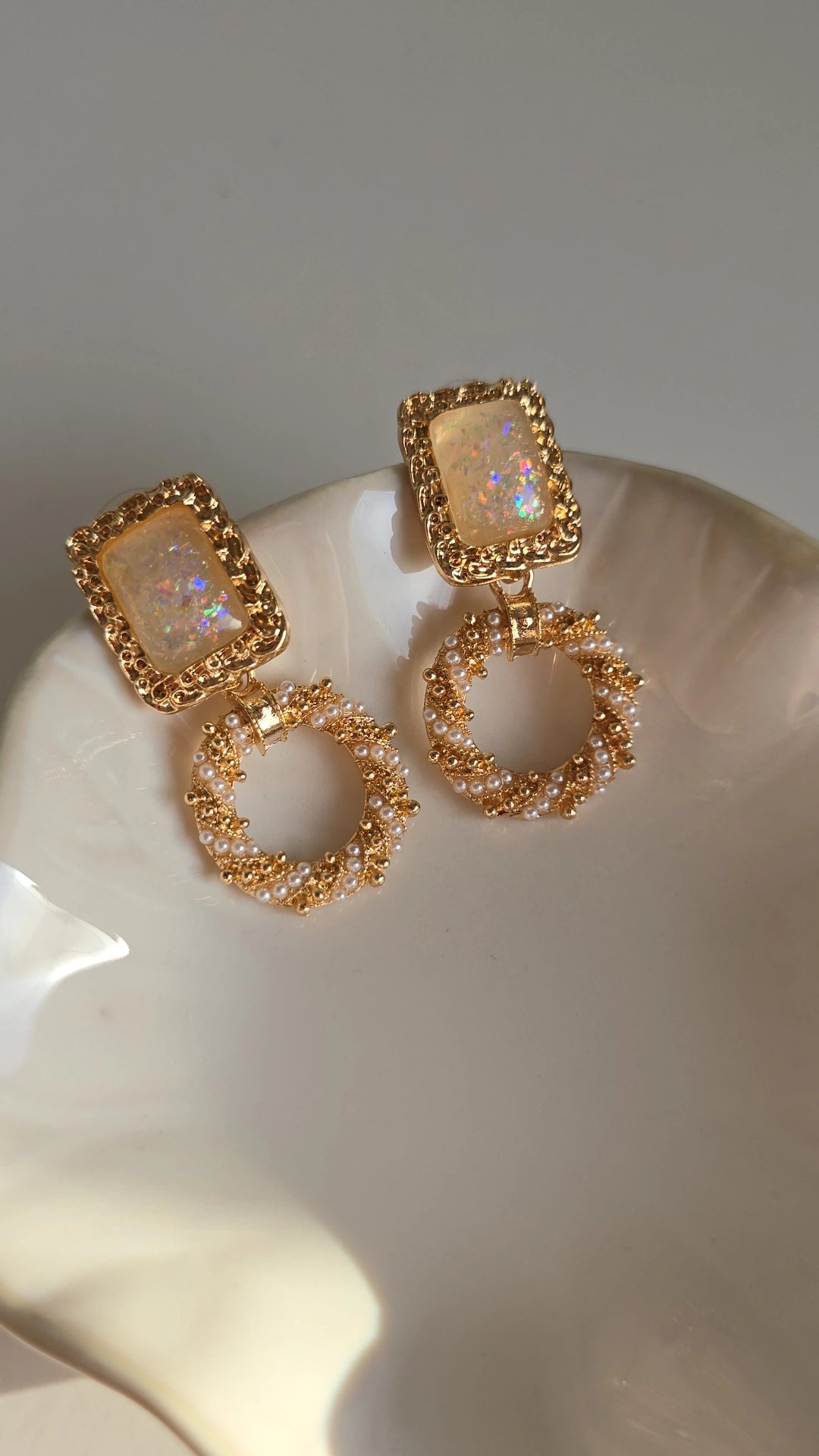 Gold plated pearl hoop earring